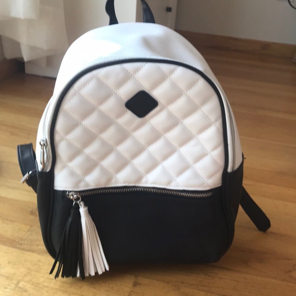 BLACK AND WHITE LEATHER BACKPACK
